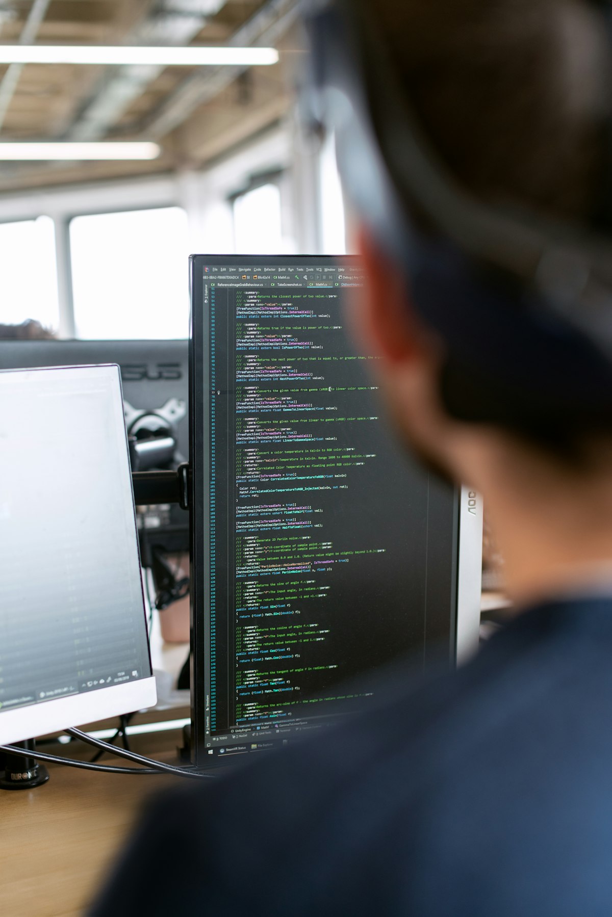 Engineer auditing machinery capability inside a supplier factory